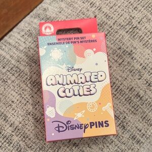 Disney Animated Cuties Mystery Pin box - Unopened. Each box contains 2 pins.